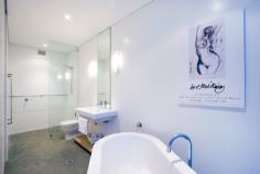  3/1 Avoca Drive Avoca Beach NSW 2251 Lifestyle – Award winning design by celebrated architect Craig 
Rosevear creating interiors that are truly refined and setting a new 
benchmark in the Avoca Beach, only 50 metres from the sand this 
apartment will accommodate the demands of permanent and seasonal living. 
 Accommodation – Two opulent levels caressed by the sound of the surf,
 4 large bedrooms, 2 with en-suites including luxurious master suite, 
3.5 bathrooms, media room, the top level is devoted to in/outdoor 
entertaining with floor to ceiling glass which maximizes the ocean 
views, galley style kitchen is fitted with luxury gaggenau appliances, 
separate bar fridge and icemaker. 
 Features – Classic bespoke materials such as glazed cabinetry, unique
 signature lighting, polished heated concrete floors are featured on 
both levels, ducted air conditioning and wood fire place, the 
combination of the location and design of this fabulous apartment makes 
it look and feel unlike any other development. 