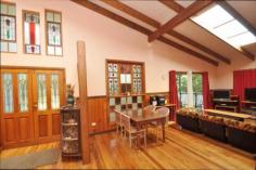  195-199 Beacon Rd North Tamborine QLD 4272 This is a well sized family home and a great kid friendly flat yard also
 has a separate self-contained cottage which would be perfect for 
Grandma or guests.... Main House * 5 bedrooms, all very spacious * 2 bathrooms, one on the living floor plus a 2-way off the master bedroom * Large formal lounge makes an ideal media room * Open plan lounge dining with cathedral ceilings & potbelly stove * Family sized kitchen with island bench and walk in pantry * Large deck upstairs off two of the bedrooms * Wide front veranda Ideal for BBQ's * Double carport plus extra under deck Cottage * One bedroom with ensuite bathroom * Combined lounge dining area * Neat kitchen * Covered veranda * Separate entrance driveway * Separate septic system The cottage is currently rented by a lovely lady who would like to stay if possible but will move on if necessa 