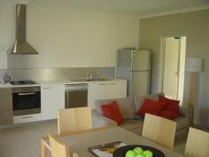  11/ 152 Esplanade, WOODGATE QLD 4660 WOODGATE BEACH is 4 hours north of Brisbane and this seaside villa is located approx 200 mtrs from the beach (pictured) and just a short stroll from the General Store, Post Office, Restaurant and Hotel. The complex boasts two swimming pools and BBQ areas, and a "village shop" plus a boutique style cafe / deli with al fresco dining are planned as part of the development. Boatramps (pictured), National Park walking trails, esplanade bikeways, 16 klms of unspoilt beach, abundant wildlife, Bowls Club, - all at your doorstep, and the facilities of Childers (25 minutes away) and Bundaberg (45 minutes away) are easily accessable. 