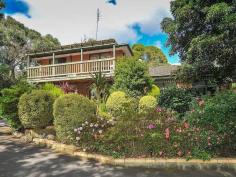  2004 Wellington Road Emerald VIC 3782 Great Position To Promote Your Home Business Actually this home is in Clematis - just minutes from the centre of Emerald. Enjoying a highly visible position that is perfect for promoting a home-based business, but tucked away behind beautifully maintained gardens, you will discover this gem-of-a home that radiates warmth and style just waiting for the next lucky owner to enjoy what it offers! With nothing to do the hardest decision to make is whether to sit on the balcony and watch the world go by or entertain family and friends on the private deck at the back.  Featuring: - Fully fenced 1/4 acre allotment - Beautifully maintained and established gardens - 1 car garage, carport and plenty of off street parking on bitumen driveway - 3 bedrooms upstairs plus an office/guest bedroom downstairs - Master bedroom with own balcony and walk in robe - Stunning bathroom with corner spa bath - Beautiful kitchen with good storage and dishwasher - Good sized living, casual and formal dining with access to decking - Ducted heating, R/C air conditioning, ducted vacuuming - Good access to back for trailer etc & two garden sheds - Water tanks for garden and sprinkler system General Features Property Type: House Bedrooms: 3 Bathrooms: 2 Land Size: 1020 m² (approx) Indoor Features Study Ducted Vacuum System Ducted Heating Outdoor Features Carport Spaces: 1 Garage Spaces: 1 Other Features Ducted Heating, Landscaped Gardens, Reverse Cycle Air Conditioning, Spa Bath, Study, Undercover Ent 