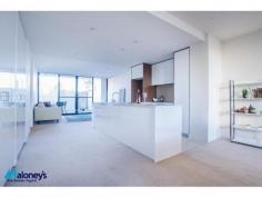  110 / 1 Mouat Street, Lyneham, ACT 2602 $529,000 Conveniently located in the highly sought after 'Axis' complex, this large, ground floor, 2 bedroom ensuite apartment features 104m2 of internal living space plus 81m2 of courtyards. Located within walking distance to both Lyneham & Dickson shops and the exciting new Braddon Precinct while still being 5 minutes' drive to the CBD, this property is a stand out. The light filled, expansive open plan living area features floor to ceiling windows & sliding doors that frame & lead directly onto the 2 large 43m2 north & south facing courtyards. With enough room to create an entertaining area with BBQ, dining table & additional greenery with pots & plants the outdoor balcony acts an extension to your living areas. The modern kitchen is beautifully finished & offers stainless steel appliances, dishwasher & stone bench tops with plenty of space to entertain & cook up a storm. 