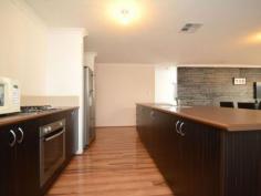  53 Barnevelder Bend Southern River WA 6110 $495,000 There is almost a blank canvas for you to 
put your own style to this near new family home. This spacious 
air-conditioned, three bedroom two bathroom home is situated opposite a 
beautiful park and although roomy it is easy care for the busy family. 
 
The main bedroom has a dual entry wardrobe that continue through to the 
ensuite bathroom with everyone's dream, a separate toilet. 
 
French doors lead into the theatre room that is larger than some in homes of this size. 
 
A galley kitchen overlooks the spacious dining/family area. This in turn
 leads out to the gabled patio area, roomy enough for a party or two in 
the coming summer months. The fridge area is plumbed for the fridge and 
gas hotplates, electric oven and pantry also compliment the kitchen. 
 
Wooden flooring has been layed throughout the living area with carpets in the bedrooms and theatre room. 
 
Sutherland Park is close by and this property is situated within close proximity to and both Albany Highway and South Street. 
 
Don't miss out on this property. Come along to the Home Open and see all the features for yourself. 