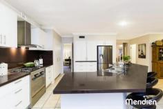  17 Patriot Place Rouse Hill NSW 2155 Elevated & Enormous Family Home - 650m2 Block Situated in a prestigious cul-de-sac this generously proportioned property boasts leafy district views from its elevated position and offers plenty of privacy for you and the family. If you are looking for large, this home will not disappoint.  Features: - Wide double door entry opens to the tiled reception foyer  - Formal living room and separate formal dining room which boasts direct access to the kitchen, ideal for dinner parties - Magnificent new polyurethane kitchen finished with granite benchtops and splashback and features s/s appliances including gas cook top and dishwasher. There is ample storage available and the large island bench provides a huge breakfast bar and food preparation area that will be appreciated by any chef - Open plan casual living is substantial with a meals solarium and spacious family room both adjacent to the kitchen. The centerpiece of this space is a stunning gas fireplace that's a real talking point - Downstairs also features a study with built-in robes, making it a potential fifth bedroom plus renovated powder room with elegant vanity. - The curved staircase has recently had a facelift with bamboo steps and treads that leads you to the gigantic upstairs rumpus - Four queen sized bedrooms with robes grace the upper level sharing a generous bathroom with double vanity and separate toilet - The master suite is sumptuous in size and perfect as a parent's retreat. The walk-in robe has loads of storage and the elegant ensuite that boasts a spa bath and separate toilet has been stylishly renovated with plantation shutters and new vanity - Outside is a large paved entertaining area covered by two shade sails that is completely private. There is a level lawn area for the kids to run about and provides ample room to add a trampoline or swingset - To complement this large and gracious home there is an auto double garage, two garden sheds and additional parking for a third vehicle or trailer perhaps.  - The home features ducted air throughout Enjoy the peacefulness of this location whilst being just minutes to major infrastructure and amenities such as the Rouse Hill Town Centre (where the future train station will be situated). There is an array of local schools all within easy reach and bus transport is readily available. The Caddies Creek Reserve is an easy stroll and the kids will enjoy feeding the ducks whilst you soak up the serenity.   PROPERTY DETAILS Status:   For Sale Price:  Price Guide: Over $890,000 Inspect:  11:00am - 11:45am Saturday, 25 October 2014 