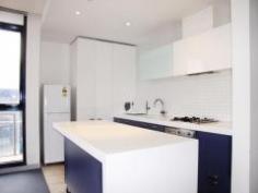 1011A/640 Swanston St Carlton VIC 3053 3 Bedrooms on the Highest Floor! Great for families, 1st home or setting up children for Melbourne Uni or RMIT! Located in the popular Carlton suburb, this architecturally designed apartment is within seconds to cosmopolitan Lygon Street, cafe life of Swanston Street and the CBD.  The large apartment offers open plan lounge and dining area, modern kitchen with Smeg appliances and island bench, main bedroom with full ensuite and walk in robe, two double bedrooms both with built in robes.  Extras include a large wrap around balcony, two undercover car parks and security intercom.  Contact Tze Chan @ 0433 619 128 for more info. General Features Property Type: Apartment Bedrooms: 3 Bathrooms: 2 Building Size: 120.00 m² (13 squares) approx Indoor Features Ensuite: 1 Living Areas: 1 Toilets: 2 Built-in Wardrobes Outdoor Features Garage Spaces: 2 Balcony Other Features Built-In Wardrobes,Close to University,Close to Transport,Formal Lounge,Terrace/Balcony 