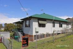  8-10 Chapman Street Frederickton NSW 2440 Hurry up and call your banker, this is a genuine, one-off opportunity to purchase this terrific home/shed/land package at a great price. The owners want to give it 2 months on the market to sell or otherwise put in a tenant paying $350/wk.  This home sits up nice and high on the hill with gorgeous open views and a wonderful distance from neighbours. Yes, it's got this wonderful openness. Firstly there's the awesome block itself - being a whopping 2,023sqm. It's technically sub-dividable or able for dual occupancy (sub. to council regs). And, it's all fabulous soil - so gardening, chooks, vegies and maybe even a small pony! Then there's the home with 'NEW' Colorbond roof/guttering and low-maintenance never-needing-painting cladding exterior. The 3 bedroom home boasts a lounge, dining, kitchen and sunroom plus a huge underneath rumpus. Plus there's another bunch of homely features like: a new stylish bathroom, built-in robes to all bedrooms, ceiling fans, dishwasher, electric cooking, 2nd toilet and scenic views. And then, there's THE SHED: a 12m x 9m brand new Colorbond with concrete floor and powered up like a Xmas tree. You can park under the double carport and leave the shed for the serious stuff! Come on, be quick, call or email us any day/anytime to talk further on this one. 