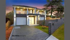  5 and 5A Hart Street, Dundas Valley, NSW 2117 VIEW | THIS Saturday 11:00 - 11:45am. Choice of 2 wonderfully appointed BRAND NEW homes set within a quiet tree lined street and boasting bright & spacious interiors with quality visible at every turn. These superb homes offer; - 4 double bedrooms with robes & ensuite to main - Generous free flowing floor plan with so much room on offer - Open plan living, kitchen & dining areas - Massive gourmet kitchen with quality inclusions and breakfast bar - Impressive covered alfresco entertaining area with timber heavily featured - Downstairs powder room with laundry attached - Internal access to a single lock-up garage with off street parking for 2 other vehicles - Level, child & pet friendly fully fenced rear yard 