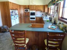  1 Laheys Creek Road Dunedoo NSW 2844 "Warwick Farm"  Approximately 145 Acres (58ha) UNRESTRICTED FREEHOLD. Situated Approx. 20 km South Dunedoo, 70km Mudgee, 100km Dubbo - 4.5 hours' drive to Sydney. Privately positioned with excellent views over the fertile Tucklan Valley famous for its Red Basalt Soils and Kurrajong trees. Substantially renovated four bedroom homestead with modern kitchen, casual living, formal lounge and dining, large enclosed entertaining area with tiled floor, office plus separate double garage, all surrounded by well-maintained gardens and high standard improvements. Climate controlled living, kitchen, lounge and main bedroom. Well balanced soils with opportunities for further cultivation, continued pasture improvement and natural grazing. Currently used in the fattening of livestock, both cattle and sheep.Excellent fencing, steel posts and hinge joint, electric two standard shearing shed, steel sheep yards, cattle yards with approximately 80 head capacity. 450 bag flat bottom silo, plus storage shed. Water includes 2x 10,000 litre tanks with equipped bore, approx. 1800L/hour. A unique opportunity to purchase a rare offering, perfectly located within easy reach of major centres. Enjoy the rural lifestyle with all that this property and comfortable homestead has to offer. Access to school bus to Dunedoo for primary and secondary education. Further potential for development into various opportunities including horse or cattle stud. Property Features Property ID 	 11367583 