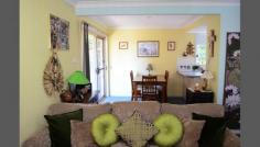 7/136 Yamba Road Yamba NSW 2464 Offers Over $225,000 You Do The Math! Current rental income of $255.00 per week with the tenant in place until early 2015. Delightful townhouse located in a welcoming quiet & family friendly complex of eight. Downstairs boasting a light filled combined open plan living & dining area. The kitchen has good size pantry, ample cupboard and bench space and easy care floor tiles. Situated off the kitchen area through sliding glass doors you will find your own private balcony and courtyard; perfect for relaxing in the evenings. Upstairs to two roomy bedrooms, both with built-ins and ceiling fans and the bathroom has shower stall and single vanity. The single remote garage has direct internal access to the home plus additional storage space and laundry and a convenient second toilet. Presenting a fantastic opportunity for home buyers or investors looking to purchase in the Yamba property market; fabulously located and only minutes to Yamba's beaches, shopping facilities, walking paths and boat ramp so whether you are looking to owner occupy or invest please contact Janelle Carpenter to arrange your private inspection. 