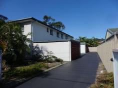  1/7 Werambie Street Toormina NSW 2452 This ultra modern unit is one that will surprise you. Spacious combined lounge and dining areas, large functional kitchen, two king size bedrooms both including mirrored robes, sytlish bathroom that includes a corner spa and double hand basin. The unit is fully tiled throughout and is bright and airy. Situated in only a small complex of four and is very secure with a shared double garage. Fantastic to either live in or rent out. Currently tenanted at $300 per week and strata is self managed which is even more appealing. Easy walk to gorgeous Boambee Bay Reserve and local shopping centres. 