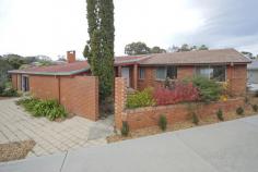  1/6 Frost Place Page ACT 2614 SPACIOUS HOME WITH FIVE BEDROOMS PLUS STUDY From the kerbside it's easy to think this well-located five bedroom home at the inner edge of Page is more compact than you might have expected but, as soon as you venture inside, you'll find an extraordinarily spacious layout that opens up more and more at every turn. Starting with a remarkably spacious front courtyard and cottage gardens, the obliquely-sited front door opens up to brick and wood panel entrance that's reminiscent of a cosy snow chalet. To the left, a carpeted sunken living room offers a private retreat that includes high-raked ceilings and an extraordinary sit-in amphitheatre around a wood-fire heater. You can explore to the right to find the evening accommodation, made up of a master bedroom that adjoins a two-way ensuite, four additional bedrooms plus a separate study as well as the home's main bathroom and toilet. Further along the hall is the kitchen, including a vast semi-circular bench top for preparation and serving, together with great cupboard space, gast stove top and appliances. It's here you'll find a large family room that could easily be adapted for a multitude of uses all of which lead through glass doors to an outdoor . General Features Property Type: Townhouse Bedrooms: 5 Bathrooms: 2 Building Size: 212.00 m² (23 squares) approx Outdoor Features Carport Spaces: 1 Garage Spaces: 1 Eco Friendly Features EER (Energy Efficiency Rating): Low (1.0) 455000 