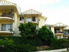  7/12-14 Camberwell Street East Brisbane Qld 416 Park Life in the City! Enjoy this lovely spacious 2 bedroom apartment in ever popular East Brisbane. Overlooking the beautiful Woolloongabba Rotary Park, there is the sense of serenity and calm right in the heart of the city. This first floor apartment boasts two good sized builtin bedrooms, modern kitchen with lots of bench and cupboard space. There is a large open plan living area that flows neatly to the covered outdoor entertainment patio which overlooks the parkland, and the bathroom is light and airy and includes the laundry. Underneath there is a large covered parking space.  With tenants in place till March 2015 this apartment makes an excellent investment. The current rental is $360 per week and the Body Corp fees are a reasonable $2781.30 per annum. If you are looking for a solid real estate investment, in a blue chip location then this is your opportunity. Close to the Antique precinct, with all the cafes, restaurants and bars. Easy access to transport and all the local amenities. Call today. Apartment Features General Features Bedroom: 2Bathrooms: 1Garaging: 1 