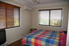  282 Bent St South Grafton NSW 2460 A home delivering great comfort, panoramic valley views and a big block. Enjoy very flexible family living with: 
 
* 3 bedrooms 
* a huge living room 
* downstairs rumpus room 
* 2-bathrooms 
* 2-toilets 
* kitchen with dining area 
* air-conditioning 
* slow combustion fireplace 
* dishwasher 
* 2-verandahs 
* single lock-up garage with workshop area 
* vehicle access to the back yard 
* wide level play areas 
* close to schools and shopping 
* excellent current rental return 