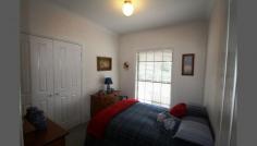  61A Greenup Street, Stanthorpe, QLD 4380 $449,000 * Set in a quiet street not far from the CBD * Elevated brick three bedroom plus office & two way ensuite, extra bathroom with shower & toilet * Enjoy the warmth & the views from the front verandah or the shaded entertaining area at the back * Exposed beams in lounge, polished floors, insulation, rainwater * Beautiful easy care gardens set on a 1536 sqm block * Spiral staircase to double garage & storage * www.raywhiteruralwarwick.com.au Property ID:1106044 