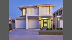  36 Morfontaine Street, North Lakes, QLD 4509 $619,000 Plus Buyers If you are looking for a luxury home that is high spec with designer finishes, low maintenance but still space for everyone (and a very short walk to the golf club), then this one is for YOU !!! This stunning home boast 4 great sized bedrooms plus study nook, multiple living areas including: dining, lounge and sitting + bonus upstairs TV area..... Not to mention GOLF frontage, private yard + swimming POOL.... does life get any better than this ??? Other notable features of this beautiful home include: - Views across the park to the golf course from an oversized alfresco entertaining area - Resort style in-ground pool - Designer kitchen with 900mm freestanding gas cooker + matching 900mm range hood and dishwasher, stone bench tops and glass splashback PLUS walk in pantry - Sliding wooden doors that open from both the lounge and meals area onto the alfresco - Large rear master bedroom with designer ensuite, stone bench tops and "his and hers" robes - Three further spacious bedrooms with robes + study nook 