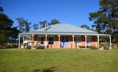  14 Payten Street Mittagong NSW 2575    Offers Over $670,000   	 This gorgeous residence exudes country charm yet is just under 5 years old.  * On nearly an acre of lawns, the home is set well back from the street to enjoy lovely garden vistas * Featuring high ceilings, wrap around verandah, wide hallway & spacious living areas * Large lounge room with combustion fireplace and outlook to the front garden * Open plan kitchen with lots of storage, timber benchtops & generous butler's pantry  * Dining area off the kitchen opening out via sliding doors to verandah * Separate tv/media room located off the hallway to the bedroom wing * Great size bedrooms, master at the front of the house with walk-in-robe & newly completed ensuite * Landscaped lawns, a variety of trees including hazelnut and pear * Gorgeous residence - ideal for families and retirees alike Property Details Bedrooms 		 4 Bathrooms 		 2 Land Area 		 3905 m2 