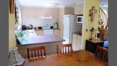 7/136 Yamba Road Yamba NSW 2464 Offers Over $225,000 You Do The Math! Current rental income of $255.00 per week with the tenant in place until early 2015. Delightful townhouse located in a welcoming quiet & family friendly complex of eight. Downstairs boasting a light filled combined open plan living & dining area. The kitchen has good size pantry, ample cupboard and bench space and easy care floor tiles. Situated off the kitchen area through sliding glass doors you will find your own private balcony and courtyard; perfect for relaxing in the evenings. Upstairs to two roomy bedrooms, both with built-ins and ceiling fans and the bathroom has shower stall and single vanity. The single remote garage has direct internal access to the home plus additional storage space and laundry and a convenient second toilet. Presenting a fantastic opportunity for home buyers or investors looking to purchase in the Yamba property market; fabulously located and only minutes to Yamba's beaches, shopping facilities, walking paths and boat ramp so whether you are looking to owner occupy or invest please contact Janelle Carpenter to arrange your private inspection. 