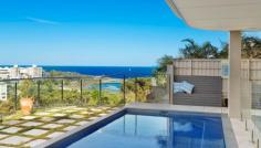  5 Highview Ave Queenscliff NSW 2096 An architectural triumph of the highest calibre, this as-new 
contemporary masterwork leaves nothing undone in its quest to provide 
the ultimate luxury retreat. Immersed in a sweeping 180 degree northerly
 panorama with stunning ocean views, its premier headland setting is 
within a few minutes stroll of the beach and village. Tri-level full brick residence with every conceivable luxury Vast open living, dining and family area with gas fireplace Glass bi-fold doors open to in/outdoor entertainers' deck Poolside family room with wet bar flows to covered patio Sophisticated Quantum Quartz island kitchen with butler's pantry Master suite with walk-in robe, ensuite and northerly deck Steam room, 3,000 bottle climate controlled wine cellar Chic bathrooms with heated underflooring, powder room Internal lift to all floors, Sydney red gum flooring, ducted air con Easycare garden with irrigation and automatic heated pool systems Stroll to Freshwater Beach and village, minutes from schools Double lock up garage, media centre, Dynalite smart system, comfort plus glass 