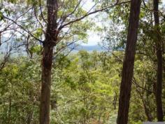 LOT 11 McLean Rd S Camp Mountain QLD 4520 CAMP MOUNTAIN - Just minutes from Ferny Grove you will find this peaceful 2.13 Hectare block sitting amongst bushland surround by State forest. This land takes advantage of the views out over Camp Mountain towards Samford valley and beyond. The block is very private and would suit anyone looking for a quite bush setting with not a neighbour in sight. Just minutes drive to train and major shopping centre