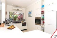  19 Lyndhurst St Gladesville NSW 2111 There are homes that ramble, there are homes with land so big you'll 
spend your weekends mowing and then there are homes like this. A home 
that lets you escape the noise and busyness of life and helps you 
connect as a couple. This home is 2 bedroom and the block is just under 
450 square meters but open plan living and the outdoor covered deck and 
paved backyard, will have you looking forward to coming home and 
enjoying life. 
 
There is no denying the home is modest, but the floor plan has this 
magic about it that gives the impression of roomy glamour. High ornate 
ceilings, useful nooks for office or library space and a private rear 
yard. This place is made for entertaining and relaxing. Air 
conditioning, ceiling fan and those French doors to the exterior keep 
this home beautifully cool. Floorboards and tiles make for easy care 
clean and cool sophistication. Cook up a storm with your gas stove top 
in a very functional modern and bright kitchen. 
 
In addition to the single carport, there is more room in the driveway 
for additional cars. A beautiful place to call home in a very convenient
 & sought after street in Gladesville, with such close access to the
 City. 
 
Come and have a look. If you are a young couple or a couple still young 
at heart, this is a home you'll enjoy every day. Like fine wine, some 
places get better with age, this is one of those. 
 
Water Rates $177.00 pq Council Rates $387.00 pq 
Land Size 448.9 sqm. 
AUCTION On Site: Saturday 29th November 4:00pm 