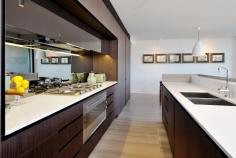 4.01/150 Walker Street North Sydney NSW 2060 Luxurious north east facing brand new spacious apartment. 
 Harbour glimpses, Open plan living, separate family area (or 4th bedroom), alfresco balcony. 
 Extra wide frontage with full height glass maximising views and light. 
 Ensuite and bathroom under floor heating. 
 Exceptionally designed and finished to the finest standards including
 travertine flooring & ceasar benchtops, Smeg appliances, ducted R/C
 airconditioning, ample storage and excellent security plus A/V 
intercom. 
 Secure  double car space plus additional large basement storage area. 
 Roof top communal BBQ area with panoramic Harbour views. 