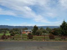  105 Saddle Rd New Norfolk TAS 7140 Lifestyle Home Stunning Views As you approach this property and enter the driveway, the post and rail fence and the sheep in the paddock may give the impression you are on a farm. Upon entering the home you are greeted by a spacious entrance hall which leads to the large lounge room with wood and electric heating. The kitchen is modern with a breakfast bar and is open plan with the dining room. The bathroom has been tastefully renovated and there are 2 bedrooms, a queen size and a huge master with a built in robe. Outside there is a double carport, a single garage with power and a secure yard that includes a great covered BBQ area for your alfresco entertaining. All on 1 hectare of land culminating in a wonderful lifestyle property or suitable for a family of 3. Only 5 minutes to New Norfolk and it’s abundance of antique shops, with Hobart 40 minutes drive. 