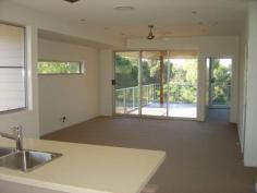  5/	17 BARRAMUNDI DRIVE,		 WOODGATE QLD 4660 DIRECTLY OPPOSITE OCEANFRONT PARKLAND, this 4 bedroom residence beckons your inspection. Just a hop, skip and a jump from the magnificent beach at WOODGATE and within a few minutes drive of Bowls Club with restaurant, hotel, boat ramps, and shopping and medical precinct. Property is fenced and features 119 square metres of exclusive grassed and garden area. THE RESIDENCE has been designed for entertaining, with living areas on both levels flowing through to ocean facing patio and deck. The property boasts OCEAN VIEWS. GROUND LEVEL:- * Patio * Entry foyer and adjacent FAMILY ROOM * 2 Double bedrooms with built-in robes * Well appointed bathroom with seperate bath and shower * Internal laundry * Staircase with storage area under * Internal access to rear double garage FIRST LEVEL:- * Spacious open plan living / dining / kitchen * Master bedroom with walk-in robe plus ensuite * Trendy kitchen featuring dishwasher * Powder room plus seperate W.C. * Second bedroom $599,000 