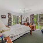  2-14 Bracken Fern Road, Yandina 4560 Come along and experience this delightful and very private, three/ four bedroom house PLUS extra fully contained unit. 
This solidly built, brick and tile home, with 2/3 living areas in the 
main house and situated on on five fabulous flat acres, would suit a 
family with horses! It would also make a perfect place for those with 
young children as they can have fun on five acres in a private and 
secure environment. 
With a double access from both Main Creek Road and Creightons Road, 
double lock up garage and double car port, as well as abundant open 
parking, this is the ideal family home and one in which entertaining and
 living, is easy! . 
There is extra parking for a campervan, which would also double up as horse shelter. 
With 3 bathrooms – 2 in main house and extra bathroom in unit, there 
will never be a queue in the mornings and the master bedroom, features 
an ensuite and walk in robe. 
The functional kitchen, with breakfast bar and open plan dining area has direct access onto the large covered alfresco area. 
A comfortable formal lounge area, which also opens out onto the outdoor 
entertaining area, is an alternative area to relax in on chilly wintry 
evenings. 
Solar panels mean reduced electricity bills and there is even a pretty 
Pagoda from which to view the parrots and other exotic bids coming to 
feed. 
This picturesque setting also features a charming bridge over the small creek. 
Call to view anytime! 