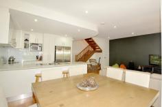  2/23-27 Coronation Avenue Pottsville NSW 2489 Stunning Seachange in a Brilliant Position Brilliantly positioned in the heart of Pottsville's bustling village, this contemporary dual level haven is within footsteps of the shops, estuary and beach. This home presents an astute investment opportunity and is set in a small modern complex. The generous features include: - A chic, open plan design with quality fittings throughout - Bi-fold doors, polished floorboards and louvered windows facing east onto the landscaped courtyard - Granite kitchen bench tops with plenty of storage space - Downstairs laundry and full bathroom, with separate w/c - Upstairs bedrooms all with quality carpet and built-in wardrobes - Master suite with enormous walk-in robe and deluxe ensuite - Floor to ceiling tiles in bathrooms, extra large bedrooms and living - you can really tell it's one of the best townhouses in the complex - Entertain amid tranquil garden surrounds on the timber deck - Single lock-up garage with internal access and ample storage Only minutes' walk from all village conveniences of shopping and cafes. Won't last long at this price. Call today to organise your inspection.   