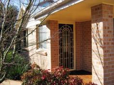 Located on the south side of Springwood just 600m to the shopping centre
 and train station, is this large four bedroom town house. This is going
 to suit many commuters and those busy couples looking for close 
proximity to the village and all its services. Featuring surprisingly 
large living spaces, the free standing townhouse is a tri level design. 
On the entry level is a sunny front porch, three bedrooms, one bathroom,
 separate toilet and ensuite. On the middle level is bedroom four 
with a storage room, a timber deck, generous living zone, kitchen and 
sliding doors, leading out to a covered verandah. There is built-in 
storage in all bedrooms, ducted air conditioning throughout, heated 
towel rails, roof insulation and insect screens and remote control 
garage door. An internal staircase leads down to a large garage with
 work bench and a laundry unit plus third toilet room. A large brick 
carport adjoins the garage. Individually designed with interesting 
glazed fixed window panels providing wonderful light into the centre of 
the townhouse, there are three timber deck sections for outdoor relaxing
 and a downstairs hobby/workshop space. The big townhouse is 26sq or 
238m² in area and does not have common walls to adjoin neighbours Phone PULSE REALESTATE Springwood on 47 51 7355 for an appointment.