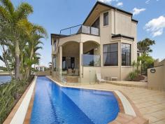 
 2 The Peninsula 
 Sovereign Islands 
 Qld 
 4216 A boat owner’s dream, 12m sheltered pontoon, Outdoor summer kitchen
 • Bar with commercial grade dual beer taps plus integrated refrigerator
 • Miele kitchen - double ovens, deep fryer, BBQ grill, coffee maker & more
 • Soundproof Media room with surround sound, office with separate entry 
 • 4 luxury bedrooms, all feature marble ensuites, Deluxe master with spa
 • 25m solar heated wave-free lap pool, Sauna, Cellar for 28 dozen bottles

 Pure Luxury with Features including: 

 29-metre waterfront with sheltered 12-metre heavy-duty pontoon 
mooring for the largest motor cruiser and direct access to the 
Broadwater. 

 East facing quiet cul-de-sac position with views to Stradbroke Island 

 6-car basement garage and large separate workshop 

 25 m solar heated wave-free lap pool with self-filling underground holding tank 

 Bar with commercial grade dual beer taps/kegs, integrated 
refrigerator and wine storage. Basement Wine cellar for 28 dozen bottles 

 Sauna 

 Soundproof media room with surround sound speaker system 

 3 separate living areas, all with views to Stradbroke Island 

 4 upstairs bedrooms all with full marble ensuited bathrooms and walk-in robes 

 Master bedroom includes dressing room, spa bath, his and her showers and bidet 

 Home office downstairs with separate entry 

 Separate downstairs marble tiled powder room 

 Huge kitchen with Miele appliances, including double ovens, 
combination deep fryer/bbq/gas and electric, microwave and built-in 
coffee maker. Twin integrated dishdrawer dishwashers. 

 Covered outdoor dining area with barbeque and hot and cold water. 

 All wool carpets 

 Zoned air-conditioning and alarm system 

 4 metre high ceilings. 

 Walk-in storeroom on upper level 

 Vacu-maid and laundry shute 