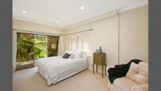  14 Pretoria Ave Mosman NSW 2088 Private Retreat In An Idyllic Balmoral Slopes Enclave Secluded amid leafy bushland surrounds on a deep approx 635sqm, this elegant contemporary residence is framed in idyllic treescape vistas creating an uplifting sense of peace and privacy. One of only a few homes in an exclusive cul-de-sac enclave on the Balmoral Slopes, it's a short stroll via a bushland path to the golden sands and tranquil waters of beautiful Balmoral Beach. Sun-drenched living areas open to deep terraces while the lower level features a versatile self-contained apartment. Soak up the serene ambiance of its unique and inspiring setting, a short stroll to Georges Heights cafes and Clifton Gardens Beach, and minutes to Mosman village.  - Deep secluded block adjoining Windward Avenue - Bright and breezy living space with a Jetmaster fireplace - Panoramic northerly bushland views, harbour glimpses - Gourmet limestone island kitchen flows to a terrace  - 3 double bedrooms, built-ins, 1 with a study/dressing room - Master suite with terrace, marble bathrooms, spa bath - Self-contained 2 bed apartment with kitchen and living  - Ideal for the multi-generational family or nanny/guest use - Terraces with retractable awnings, sheltered courtyard  - Sprawling native gardens, lock-up garage plus parking 