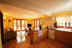  Korora, NSW 2450                     $580,000 A beautifully presented, substantial, four bedroom, two bathroom family home in one of the most highly regarded locations in north Coffs. The property extends over two levels and the design has resulted in generous living areas, complimented by an excellent first floor layout which features a superb master suite with attic storage as a bonus. The formal lounge and dining rooms have double height vaulted ceilings and French doors leading to the private enclosed garden with a substantial patio area, sparkling in - ground pool, marvellous for outdoor entertaining and relaxation. The sunny family room also flows through to the inviting patio areas and meals are prepared in the well-equipped kitchen with features Caesar stone bench tops, large pantry, dishwasher, wall oven and more. There are three bedrooms downstairs with a main bathroom with spa bath making it an ideal family home with parent’s retreat upstairs and the youngsters downstairs. 