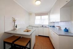  2/42 Adelaide Street, Armadale Vic 3143 $460,000-$500,000 Proudly situated in one of Armadale's most desirable tree-lined streets surrounded by prestigious homes, this north-facing ground-floor apartment with frontage to Bell Street is an excellent entry point into a coveted Armadale lifestyle. The convenient location close to High Street and Glenferrie Road's shops, cafes and trams adds to the home buyer or investment appeal. A well-maintained block of only eight apartments forms the ideal introduction to this prestige area. The light-filled interior includes a north-facing living and dining room framed with large windows and a separate efficient kitchen with a dishwasher, breakfast bar and access to the rear undercover car space. Two bedrooms, each with built-in robes, enjoy a contemporary bathroom with a bath and separate toilet. A mix of timber floorboards and quality carpet add the perfect finishing touch.   