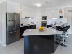  9 CONESTOGA WAY Upper Coomera QLD 4209 Coomera Retreat....Will Be Sold!!!! This fantastic modern designed Ex Display Home in the always popular "Coomera Retreat" Precinct offers resort style living with multiple living spaces that overlook a substantial private alfresco area, with a air conditioned converted garage now consisting of a 5th Bedroom and large lounge area and it's own entrance making it perfect for the teenagers of the family. you will enjoy the added bonus of being within a short stroll to the bustling Coomera Town Centre and all it has to offer. Other Features Include; Coomera Retreat 5 Bedrooms Study 4 Living Areas Separate Dining Area Large Kitchen CaesarStone Bench Tops Twin Drawer Dishwasher Ducted Air-Conditioning Alarm System Large Garden Shed 613sqm Block Less than 500m to Coomera Town Centre Easy Walking distance to Outstanding local Schools Plus loads more features For more information or to organise and Inspection please do not hesitate to Contact the Listing Agent anytime. General Features Property Type: House Bedrooms: 5 Bathrooms: 2 Building Size: 30.00 m² (3 squares) approx Land Size: 613 m² (approx) Indoor Features Ensuite: 1 Living Areas: 4 Toilets: 2 Alarm System Study Broadband Internet Available Pay TV Access Dishwasher Rumpus Room Ducted Heating Ducted Cooling Outdoor Features Outdoor Entertaining Area Shed Fully Fenced Eco Friendly Features Water Tank Offer Over $500,000 