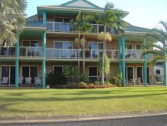  2/	29 Barramundi Drive,		WOODGATE QLD 4660 Situated in Barramundi Drive WOODGATE BEACH this ground floor two bedroom unit has pleasant views over adjacent parkland and has some OCEAN GLIMPSES as a bonus. The parkland opposite the complex is the starting point for kilometres of paved cycling / walking paths which run the full length of the esplanade and beyond, connecting recreation areas to shopping precincts, Bowls Club with restaurant, boatramp, hotel etc. The beach (pictured) is only 150 metres from the property and is easily accessed via walkways through the natural dune vegetation. The ground floor residence is on the northern side of the complex and consists of:- * Open plan roomy lounge / dining area (airconditioned) * Central kitchen with loads of storage * Two bedrooms (built-in robes plus ceiling fans) * Master bedroom is of generous proportions and is airconditioned * Good size bathroom plus seperate toilet * Internal laundry * Patio areas both front and rear * Single lock-up garage $395,000 
