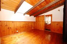  40 Johns Crescent, Mount Evelyn, VIC 3796   $420,000 Plus On Approx Three Quarter Acre There is no other like it! Built with a mix of recycled 100 year old bricks, stone from the site and weatherboards, pieces of an old shearing shed, lead light windows and rough hewn timbers. Timber kitchen overlooks the big deck that sits amongst the greenery for privacy and pretty treed outlook. Open plan lounge with split level to formal dining and a lovely curved staircase to the mezzanine master bedroom and ensuite. Downstairs is a further two bedrooms, with both being double in size and one opening out onto the deck. Large picture windows make the most of the lovely treed outlook, with great out door entertaining on a large deck, overlooking the big, big back yard nicely. (approx 3,000 metre block) The emphasis is on a tranquil lifestyle If you are looking for something very special, and are ready for a renovation project, this home says welcome. 