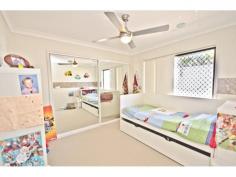  6 Aroona Avenue, Broadbeach Waters QLD 4218 The perfect family home, step inside this property and you’ll instantly be able to picture your future—sun filled summer days relaxing around the family pool and the smell of Sunday morning pancakes wafting from the generous breakfast bar. This four bedroom home really was built with family in mind. Two ensuites plus an extra bathroom means that those weekday bathroom queues will be a thing of the past. Features such as an open plan layout, two living areas, four parking spaces, modern interiors and dual access from either Aroona or Rudd Street ensure that this property ticks all the boxes for a large family. The wet bar, perfect for summer entertaining, opens directly to the covered alfresco area and swimming pool. And, if you have pets or young children, you can relax in the knowledge that the grounds are completely fenced with plenty of grass to the front for kicking a ball or simply running amok. negotiable at $740,000 