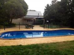  2 Jones Street Avenel VIC 3664 FAMILY HOME FULL OF CHARACTER & CHARM * Inviting country style 4 bedroom home * Spacious open plan dining & living areas * Modern kitchen with island bench & gas cooking  * Slow combustion wood heater, reverse cycle air conditioner  * 2 car garage with roller door & workshop * Solar heated swimming pool in large established garden setting * Paved outdoor alfresco area perfect for entertaining  * Sought after large 2000m2 block  * Located in the centre of Avenel township, walk to everything! View Sold Properties for this Location View Auction Results General Features Property Type: House Bedrooms: 4 Bathrooms: 1 Land Size: 2000 m² (approx) Indoor Features Dishwasher Reverse-cycle Air Conditioning Outdoor Features Garage Spaces: 2 Outdoor Entertaining Area Swimming Pool - Inground PRICE REDUCED $380,000 