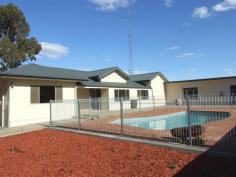  Barmera SA, 5345 Very Spacious Family Home Newly renovated in a very appealing decor and finishes to provide an open, spacious, excellent family home! Quality timber laminated flooring throughout, huge open plan living plus separate rumpus room - the ideal home for large families. Brand new kitchen with all new appliances and an abundance of cupboards and working bench space with a long breakfast bar; great for informal meals plus the huge walk-in pantry with built-in floor to ceiling shelving. Four very large bedrooms, each with timber flooring and air-conditioning ducts while the main bedroom has built-in sliding robes. Two newly renovated bathrooms in charcoal and white decor plus the large laundry with extra floor to ceiling built-in cupboards. Ducted reverse cycle air-conditioning throughout the home, plus R/C split system in the rumpus room. Adjoining the rumpus room is an enclosed pool room and both overlook the inground salt chlorinated pool. Fully paved surrounds, compliant safety fencing plus all new automated pump and filters. The home sits on 2.8 acres of land with a beautiful outlook over neighboring vineyards. Included is a domestic CIT water allocation plus large rainwater storage, a 2 car carport for vehicle storage plus an adjoining wine storage room. All located just a short drive into Barmera. An inspection is recommended to fully appreciate all this property has to offer. For further details or to organise your inspection, please contact Violet Patty on 0468 388 390. RLA: 61544 