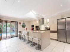 426 Anzac Ave Kippa-Ring Qld 4021 On this incredible 1214m2 block (on 2 titles) sits a brilliant family home.
 3 huge bedrooms all built in, plus a study or 4th bedroom. Open plan
 living with complete flexibility on offer plus a 4 car garage/workshop.
 The chef's kitchen is modern with enormous bench top and full suite of stainless steel Meile appliances. 
 The home is full of natural light courtesy of electric panelled 
skylights and all year round comfort is assured courtesy of reverse 
cycle air conditioning.
 The home theatre room is a highlight including state of the art projector and BOSE surround sound.
 If you don't feel like a movie then how about getting the kids into 
the pool - its enormous - 70,000 litres and serviced by a bathroom and a
 cabana and can be kept topped up with the rain water tank. 
 If you are a family who like to relax and entertain this property is perfect for you! 