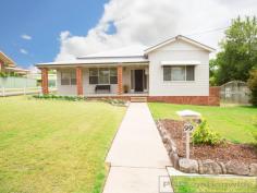  99 Victoria St   East Maitland   NSW   2323 This is your opportunity to secure a lovely home in one of the best streets in East Maitland and sitting on one of the very last oversized 1,100sqm block. A fully landscaped & manicured exterior will welcome you from the moment you arrive. Stepping inside you will really feel the space of this large family home with high ceilings throughout, large bedrooms, 2 separate living rooms, beautiful Jarrah timber kitchen, new bathroom, 2nd toilet, natural gas, split system air & all of your stainless steel appliances through the kitchen. As you make your way to the rear of the home you will step out into your fully enclosed & insulated entertaining area as well you find another large room perfect for a home business, theatre room or man cave.  To add even more space you have a double garage with double carport off the main house, plus at the rear of the property a huge 10m by 6m double caravan garage with 2.9m high roller doors. With so much on offer and so many options this home will suit your lifestyle perfectly. 