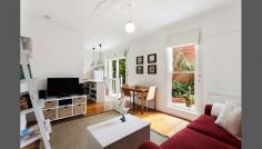  16/20 Princes Street, St Kilda, VIC 3182 Wonderfully secluded and with its own leafy courtyard, this fantastic one bedroom apartment is the perfect change of pace. On its own title and positioned at the rear of the block, this peaceful pad is splashed with original timber floors and ornate ceilings, and showcases a light-filled central living area, kitchen with island bench, pendant lighting, and stainless steel Ariston appliances, sizeable bedroom, and retro bathroom with charming leadlight window and laundry with Samsung washer dryer. The sensational courtyard garden has a north-westerly aspect and is an idyllic spot for alfresco meals or just having a relaxing drink on a balmy summer's night, while additional features of this residence include a large outside storage shed, heating, and air-conditioning. A great opportunity for first home buyers and in a vibrant location only a stone's throw to Fitzroy Street and Acland Street cafes and restaurants, Albert Park Lake, MSAC, St Kilda Beach, Chapel Street, and public transport. 
