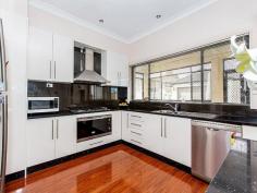  40 Mimosa Road Greenacre NSW 2190 Perfect Designer Family Home Positioned in a premier street on the high side, this absolutely stunning, renovated and beautifully presented 3 story brick rendered family home offers state-of-the-art family living. It provides a lifestyle of position, prestige and complete convenience with schools, shops and transport. Offering 7-8 generous sized bedrooms all with built ins, four bedrooms with en-suites two with balconies, and two with walk in robes. This family home has it all, Main Features include: 7-8 Large Bedrooms, master has walk-in robe, en-suite and balcony Original luxury spa bathroom plus four en-suite bathrooms  Spacious separate formal living and dining areas, open plan living and dining options Soaring high ceilings, with unique grain texture timber flooring throughout Modern polyurethane gas kitchen with caesar stone bench tops, leading out to a tiled party size entertaining sunroom. Feel secure with security cameras, alarm system and video intercom for both up and downstairs. Triple automatic remote control lock-up garage complete with storeroom basement Level 1.5 car space garage, with driveway access to ample parking to hold up to 6-8 ... show more View Sold Properties for this Location View Auction Results General Features Property Type: House Bedrooms: 8 Bathrooms: 5 Offers Over $1.4 Million 