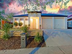  4 Jabiru Pl Huntfield Heights SA 5163 $385,000-$395,000 This modern property is an exceptional contemporary family home, offering a functional family design with ample room for parents and children alike. For tremendous value in the south, this one must be considered. Located in the new Paringa Views Estate in a small, neat, cul-de-sac. You'll find that quiet, security and comfort are all here for you. Having your kids play in the beautiful park over the road or ride out on a street without traffic, is a huge bonus. Conveniently located near new dual Southern Expressway and Main South Road, you'll find you can head towards the city with ease. Shops and services are nearby at Colonnades. The scenic Onkaparinga River is so close, should you like fishing, kayaking or hiking. Featuring four bedrooms, two living areas and a spacious outdoor entertaining area, an elegant, yet functional set-up awaits. The frontage boasts easy-to-care for landscaping, double driveway, side storage and a secure lock-up, automatic double garage. This garage also has a rear roller door for access to the yard, as well as an internal door for secure entry to the home. Perfect for when it's pouring outside. Presently set up as a home gym it gives versatility to the home. 