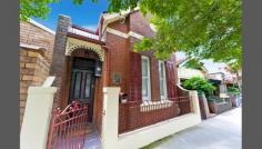  33A Annesley St Leichhardt NSW 2040 Character Cottage With A Light Filled Two-level Design A traditional brick home of good size and character is hard to find in this tightly-held Leichhardt pocket. Behind its classic brick facade is a generous floorplan that includes high ceilings, generously proportioned rooms and a bright two-level layout with some tasteful modern updates. Buyers and investors will be immediately impressed by its superb setting in a popular location with village cafes, parks and pubs all within easy access. -Lounge room and separate dining area -North facing rear garden and paved area -RLA parking with scope for second space -Parents' retreat with ensuite and balcony  -Elevated district views from upstairs -Extra living space that leads outdoors -Potential for creative updates or design 