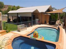  66 Hillside Gardens, Desert Springs NT 0870 ELEGANCE, LUXURY AND LIFESTYLE... $1,125,000 You can live in style & luxury in Desert Springs Estate. You will enjoy coming home after a busy day at work. Elevated executive residence, the perfect home if you enjoy indoor and outdoor entertaining. This superb family home has so much to offer. - 4 good sized bedrooms all with TV outlets - 3 bathrooms with the main recently renovated - Large study/office with built in cupboards - Media room with space to enjoy watching movies - Huge front balcony to enjoy the magic range views & sunsets - Spacious open plan living, dining & kitchen at the rear of the home - Under covered entertaining area off the kitchen  - Sparkling in-ground salt water swimming pool with a separate spa - French doors access to the private courtyard to enjoy & relax - Fully reticulated lawn & gardens - Crime safe throughout with a full security camera system - 4.5kw solar system, solar HWS & tinted windows - Intercom system through out - Foxtel & pay TV connections - 2 evaporative air conditioners & 3 gas outlets  - Double lock up garage & workshop with steel benches - Lockable shed for the buggy & bikes - Spacious gym with TV outlets - School bus at the front door This home has the space, style & offers the lifestyle to keep everybody happy. The perfect place to start building memories... Call Jackie to arrange an inspection. 