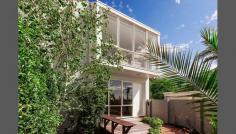  1B Wordsworth Street, St Kilda, VIC 3182 Flooded with gorgeous daylight in every direction, this designer townhouse showcases a smart designer living and picture-perfect bay views, right at the most premier beachfront location of St Kilda! Not often such a rare opportunity would arise in the tightly-held foreshore market, with 6 kilometres of uninterrupted beach esplanade at your doorstep! Let the well-groomed sun deck patio welcome you to a generous front lounge dressed with luxurious bamboo floorboards and clean open lines of bay side architecture. The spacious dining hall at rear will also impress, with a fully-equipped gas kitchen, high-sheen polished granite tiles and a trendy cocktail bar - all overflowing onto a huge sunlit alfresco courtyard and manicured gardens, ready for every outdoor entertainment occasion or simply a perfect day in the sun, right at home. 