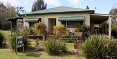  16 Cowper St Stroud NSW 2425 For Sale  $250,000 Offers Over - House This property has that “Old Style Charm” located within minutes to town, this property should be on your list to inspect.  Polished timber floors throughout, ducted air conditioning, country style  kitchen with dining area, 3 double size bedrooms and 2 bathrooms.  Lounge room has a combustion fire and french doors opening out onto the verandah that wraps around the home with beautiful country outlook, private rear yard with shed and enclosed carport. Currently leased with tenants, this could be your next investment property or perfect for the first home buyer.  Call Kim for your inspection today.  0427949336. 