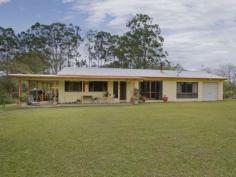 56 London Creek Road, Peachester, 4519 Northfacing, private Bessa Block home, nestled on 8 acres of land 
with 360 degree views, including Mt Beerwah, Mt Mellum, and Mary 
Cairncross Park.  Perfect for Horses! 
 HOUSE FEATURES: 
* The house is full of character with fully insulated raked ceilings and
 a solid stone feature wall between lounge room and main bedroom. 
Wrap around verandah from Front Door around end of house (BBQ area) 
* 4 bedrooms — main bedroom has a large changing room attached 
* 3 car spaces in shed and the 1 attached to the house. 2 open car spaces and 2 secure car spaces. 
* Single garage attached to western end of house -could easily be 
converted to a self-contained granny flat with TV outlet, lights and 
electricity already installed. 
* Lounge room, large kitchen and dining room with large walk in pantry and full gas cooking stove top and wall oven. 
* Ample bench and cupboard space. 
* Large bathroom with built in storage cupboard, separate large shower, vanity and bath. 
* Home is tiled throughout for easy cleaning. 
* Wood fire/heater with plentiful supply of firewood from land. 
* Bosch Hot water system with instantaneous turbo ignition gas. 
* Automatic tank switch when one gas tank runs out. 
* Outside lighting at front, end and back of house. There are 2 Flouro lights in BBQ area. 