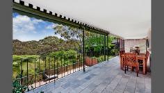  13 Drumcliff Ave Killarney Heights NSW 2087 "Cromarty" - Bushside Manor House 13 Drumcliff Avenue, Killarney Heights is proudly presented by Ray White Fairweather Group. Peacefully situated beside Garigal National Park and only a stone's throw from the shores of Middle Harbour, this charming, spacious and well maintained family residence features multiple living and lounge areas, a near new gourmet granite kitchen with premium appliances, open bush and district vistas to Roseville Chase, four light and airy bedrooms and expansive entertaining decks overlooking a sparkling fully tiled solar heated pool. Feed the visiting bird life as you unwind with the morning paper and a coffee, gazing occasionally across the treetops of your own National Park backdrop. Take the kids on a bushwalk to Killarney's Flatrock Beach or head west to Davidson Park for a picnic - your options are endless in this secluded but convenient location. * Formal and informal dining, separate lounge and family spaces, master with ensuite and powder room * Ducted reverse-cycle air-conditioning, ceiling fans, gas heating, walk-in robe, plenty of storage * Double garage with workshop and internal access, established easy-care gardens, 715sqm block * Close to local schools, shops, transport, playing fields and bush walking trails *** If you don't have your finances sorted, just ask us - our in-house LoanMarket broker can assist you with over 30 lenders to choose from! Call us on 9975 HOME to arrange a FREE private meeting.*** 